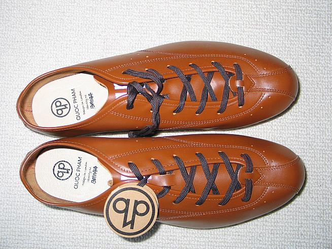 A pair of tan fixed shoes from Quoc Pham