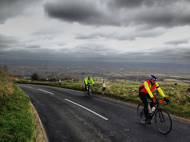 Riders crest Ditchling Beacon - the summit finish to the Puncheur.