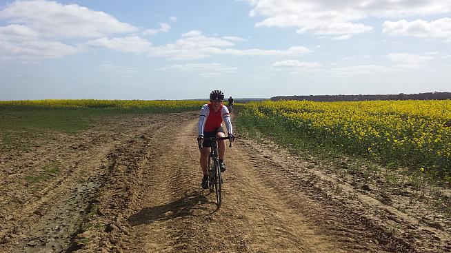 A rider forgets the rule about not smiling on the Hell of the North.