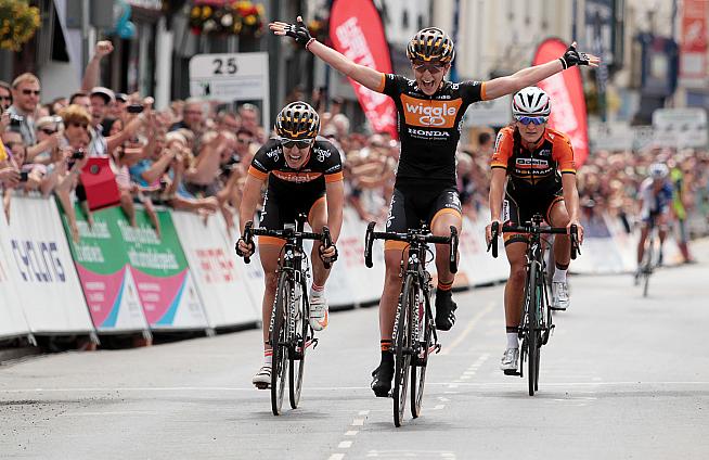 Laura Trott celebrates after beating Elizabeth Armitstead (2nd) and Danielle King (3rd) to the line to win the National Road Race Championships in June. Photo © Huw Evans