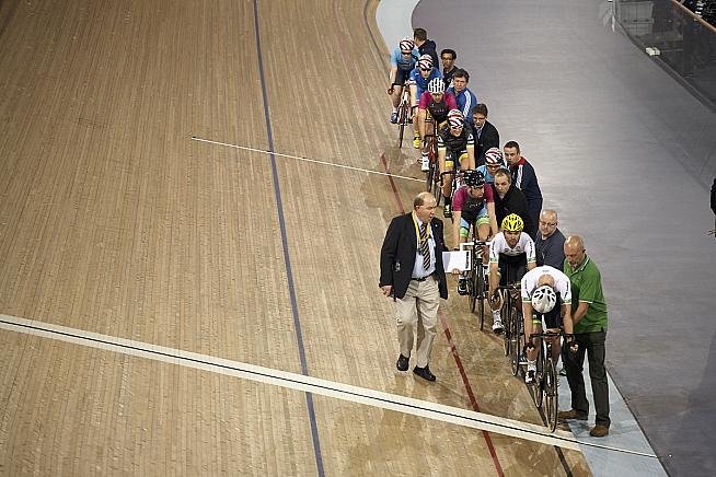 The commissaire inspects the start line for the International Derny Race. Photo: Toby Andrew