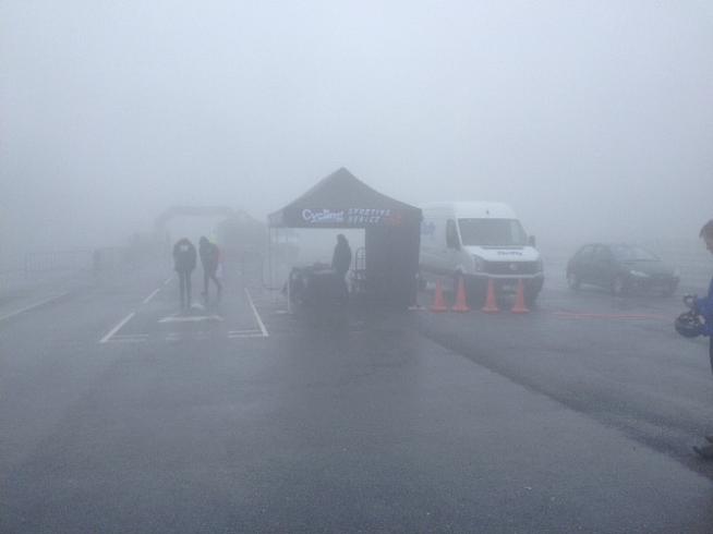 The finish line appears from the fog at Exeter racecourse.
