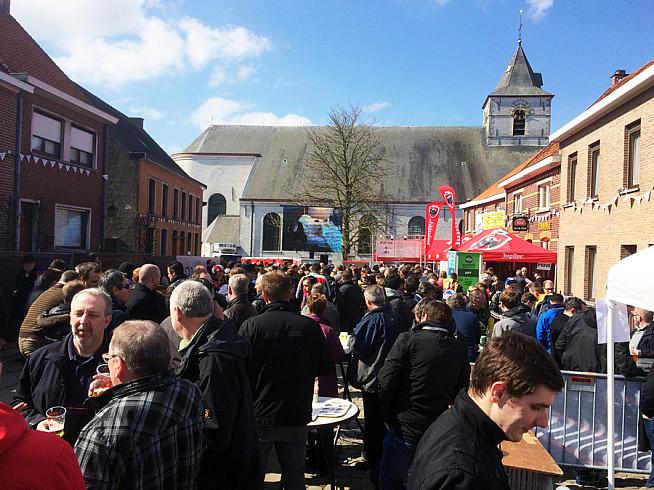 A packed town square on race day.