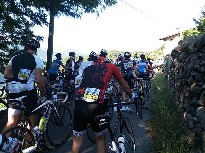 The first proper climb into Teglio where dismounted riders halted progress.