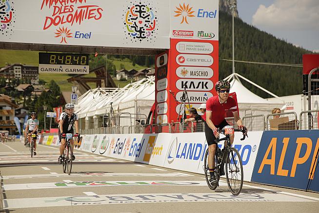 JSS crosses the line after a long day in the saddle at the Maratona (photo credit: Sportograf.com)