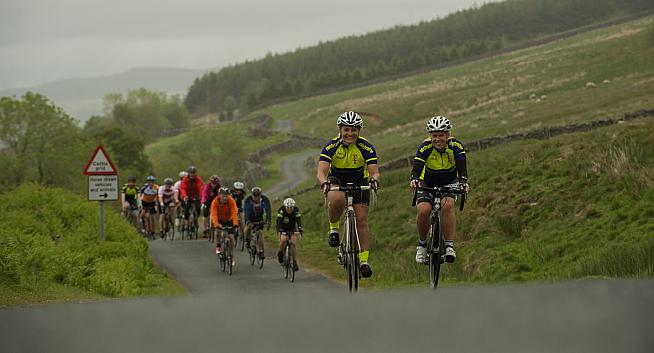 The peloton winds its way across the Yorkshire Dales.