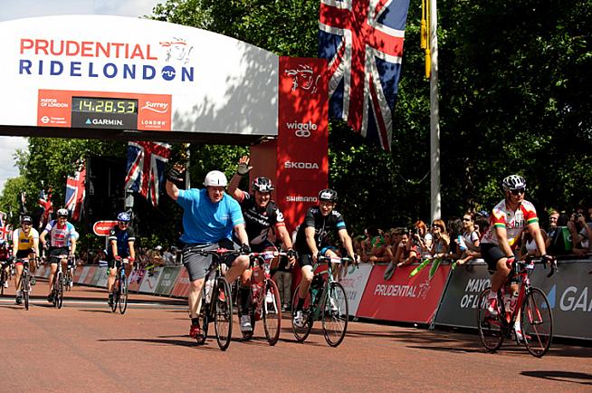 Watch out  here comes the boss. Mayor Boris Johnson trundles over the finish line.