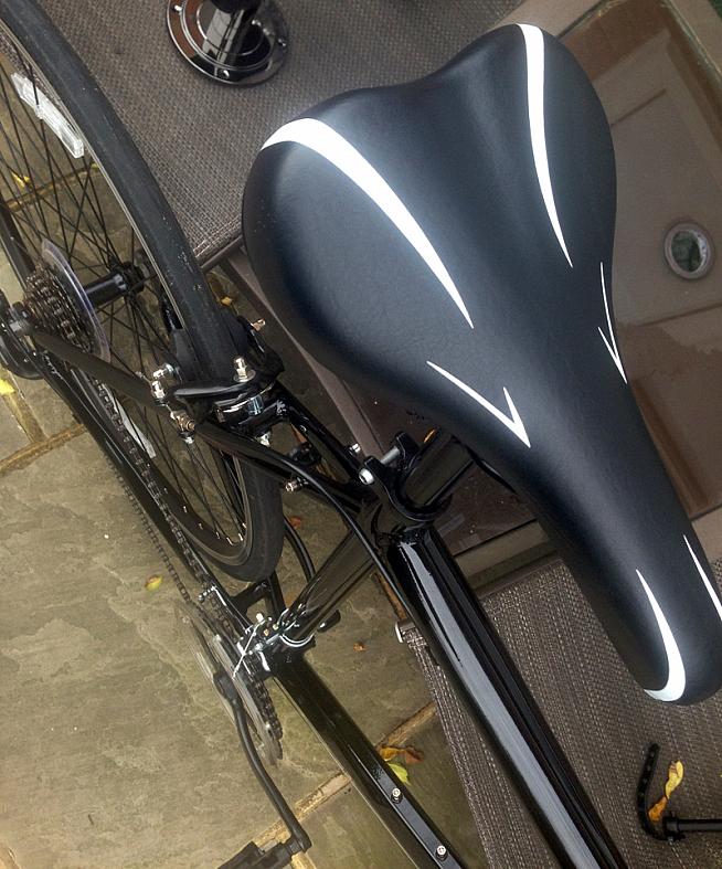 The stock saddle looks basic but is surprisingly comfortable on a short ride.