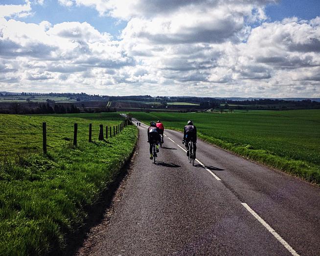 Riders enjoy a flat stretch in spring sunshine.
