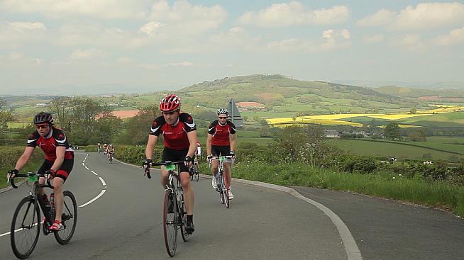 Cyclists crest one of the many climbs on the course. Photo: UKCE