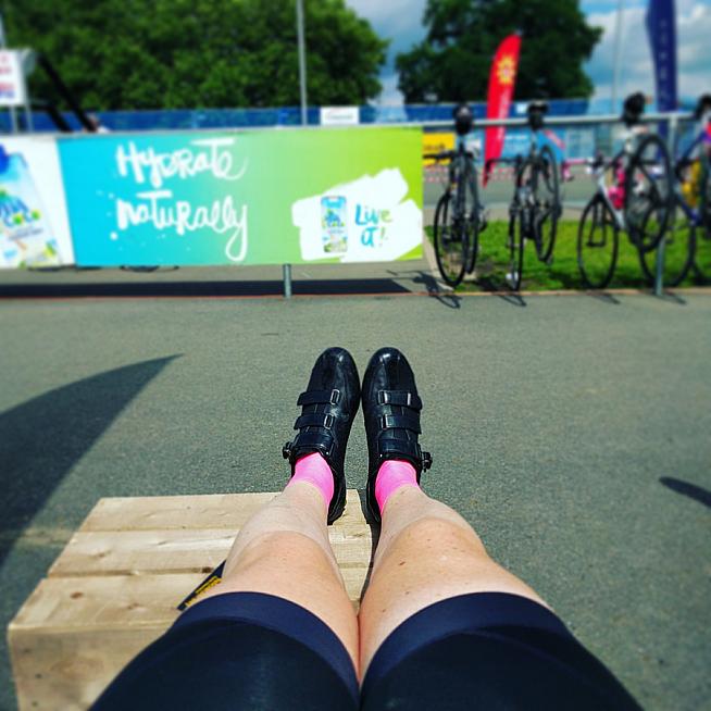 Topping up tanlines at the velodrome.