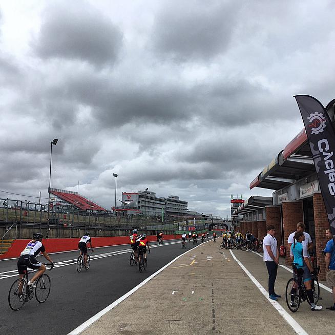 Riders roll out to the start grid.