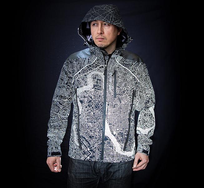Discreet by day  the Atlas Jacket's reflective pattern comes to life at night under headlights.