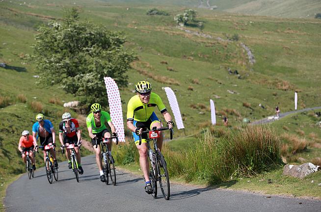 Cyclists tackle the KOM challenge on the Dragon Ride. Human Race have found 200 extra places down the back of the sofa.