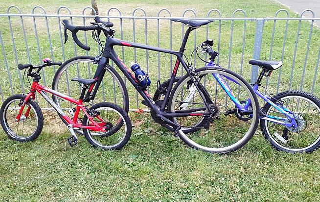 Dan's Scott Addict (centre) is a lightweight climbing machine.