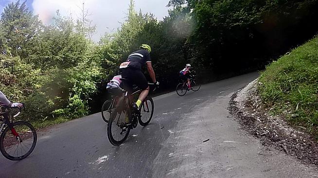 Tackling the famous zig-zag hairpins of Box Hill.