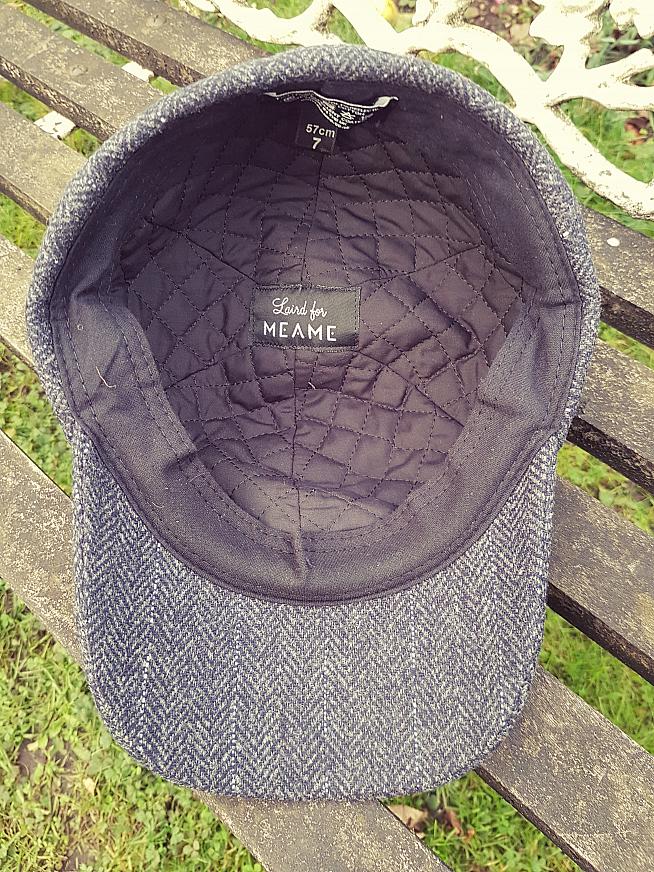 The inside of the MEAME tweed cap