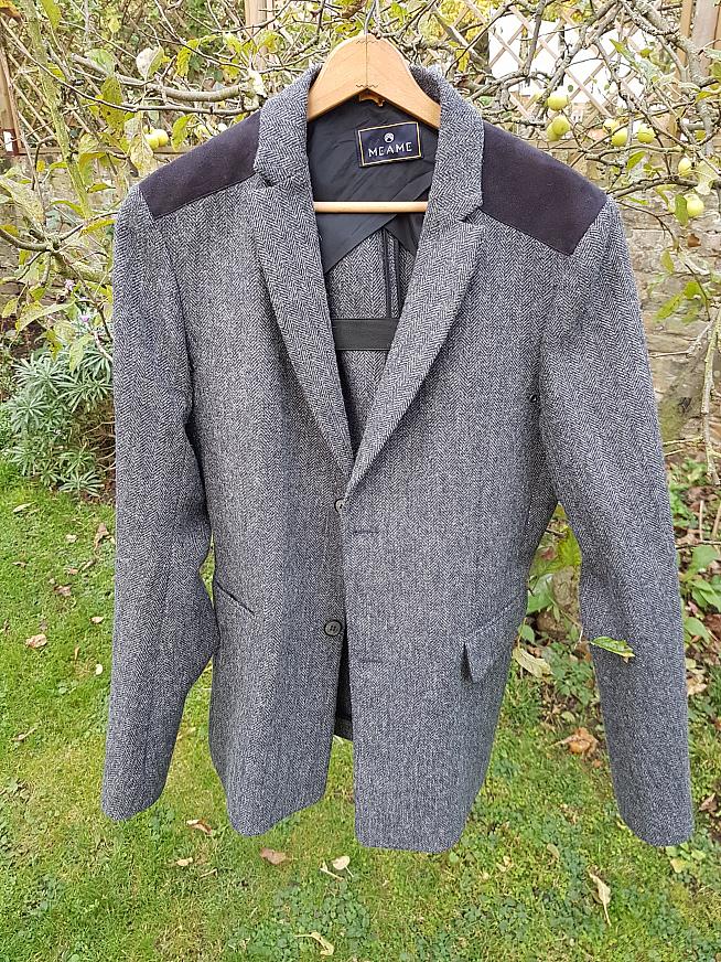 The front of the Meame tweed jacket.