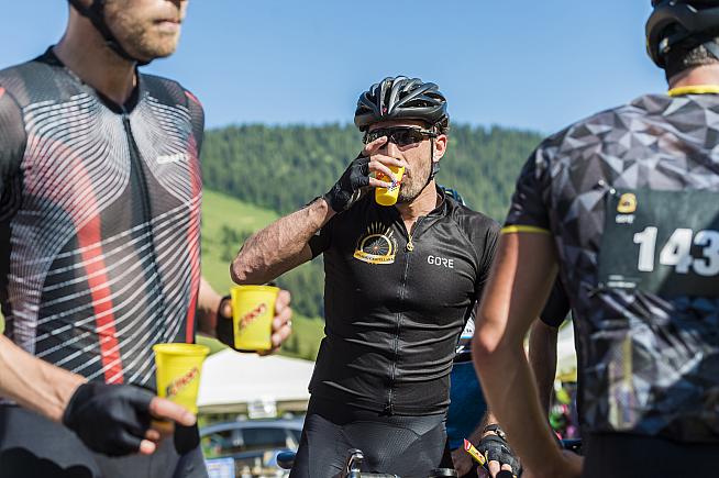 A well earned drink for Cancellara as he awaits fellow riders. Phil Gale / Emmie Collinge