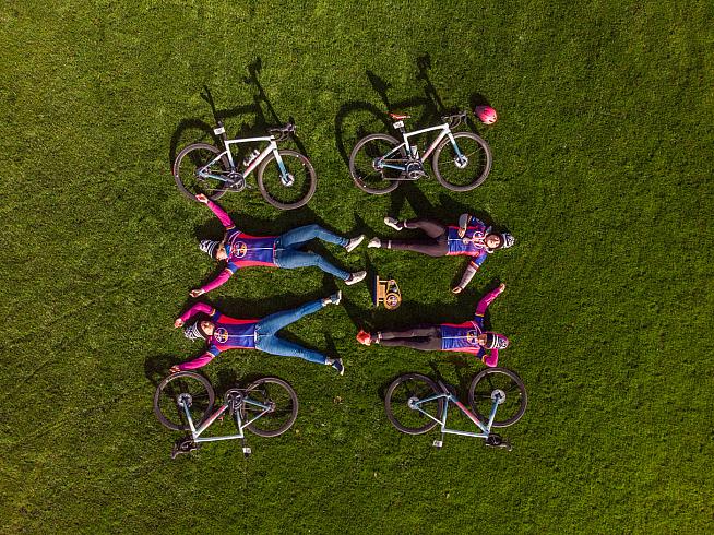 Specialized Women celebrate their win with a lie down. Photo: Leo Francis / Red Bull