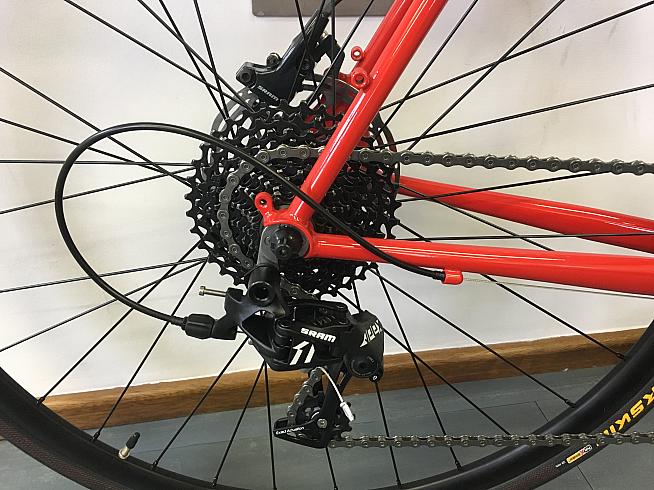 The SRAM 11 speed derailleur can handle up to a 42T cassette.