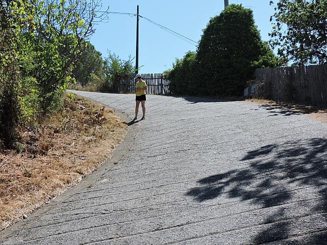 Rider's wife pretending to be interested in the gradient!