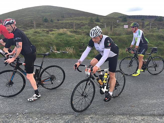 Honestly he does smile sometimes - but not after grinding up Slieve Mann...