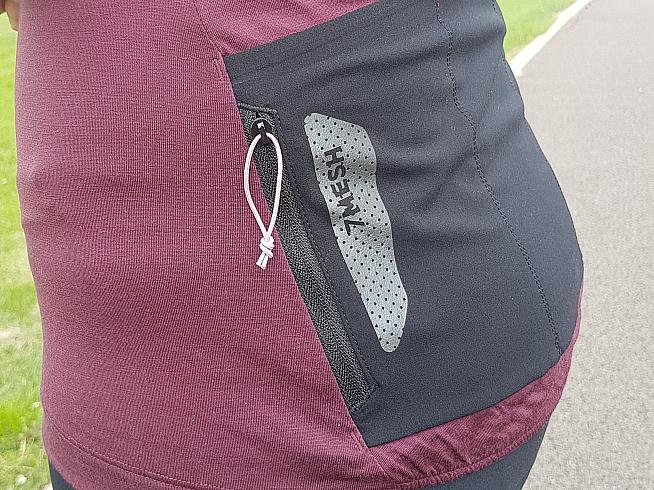 Zip pockets either side provide a secure place to stash valuables during the ride.