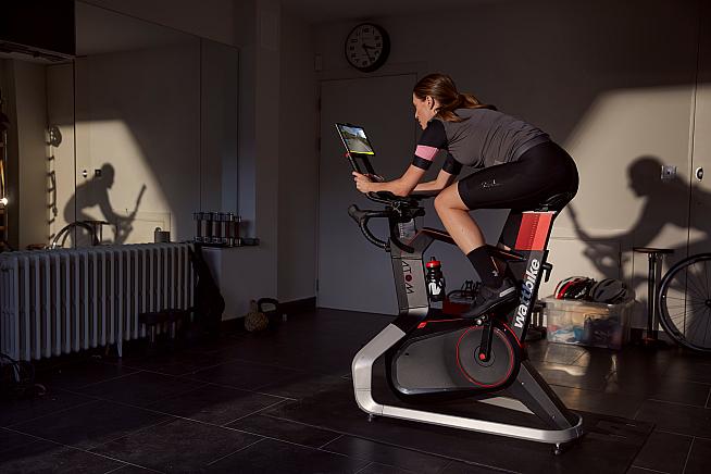 Ride and race real-world courses indoors with Wattbike and ROUVY.