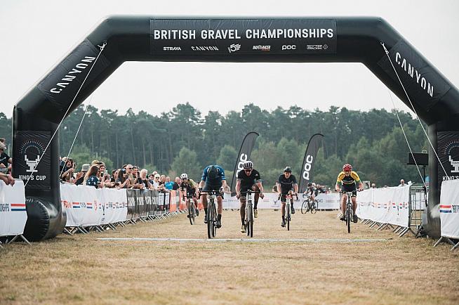 Peter Levenspiel - right - enjoys a front row view of the sprint finish. Photo: Rupert Fowler