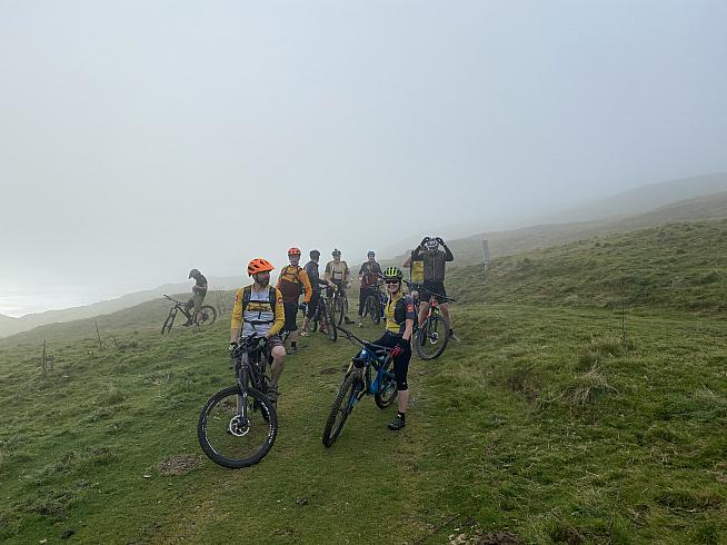 Riders pause to regroup on the first ascent of the Slieve Martin Slaughter.