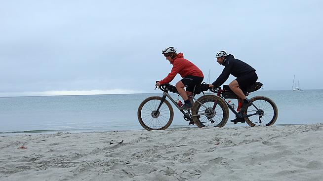 Jenny Graham and Mark Beaumont cycling on the Isle of Gigha. Photo: Markus Stitz