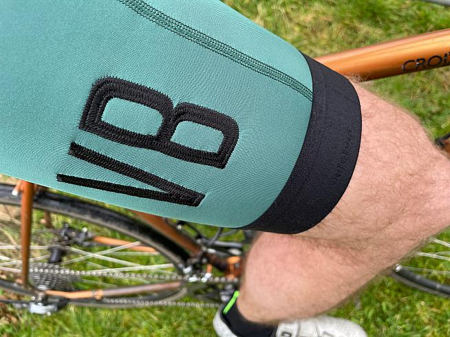 Stylish embroidered logos feature on the leg.