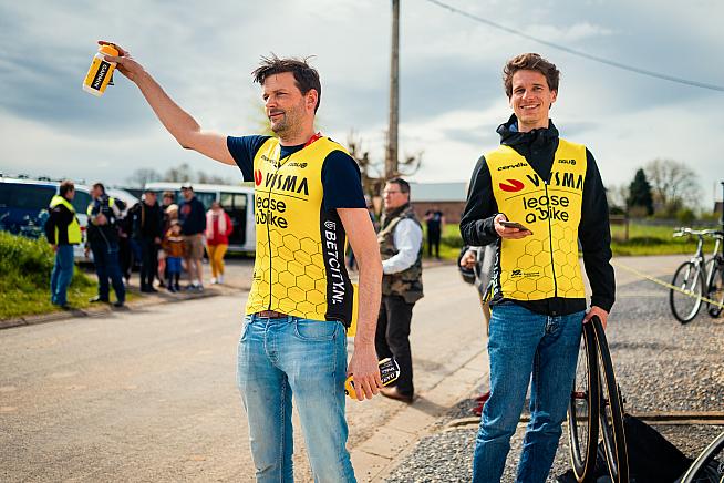 A Sportive Breaks client hands out bottles at Paris Roubaix.