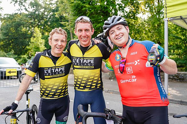 Dan Martin celebrates with friends at the finish line.