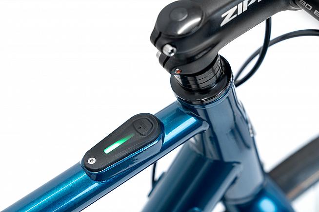 A button on the top tube controls the motor.