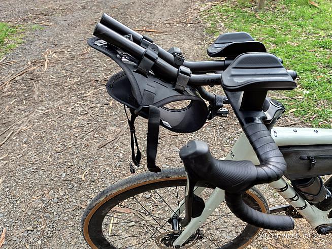 The Race Aero Bar Bag features a secure holster with a lightweight dry bag that can be quickly removed.